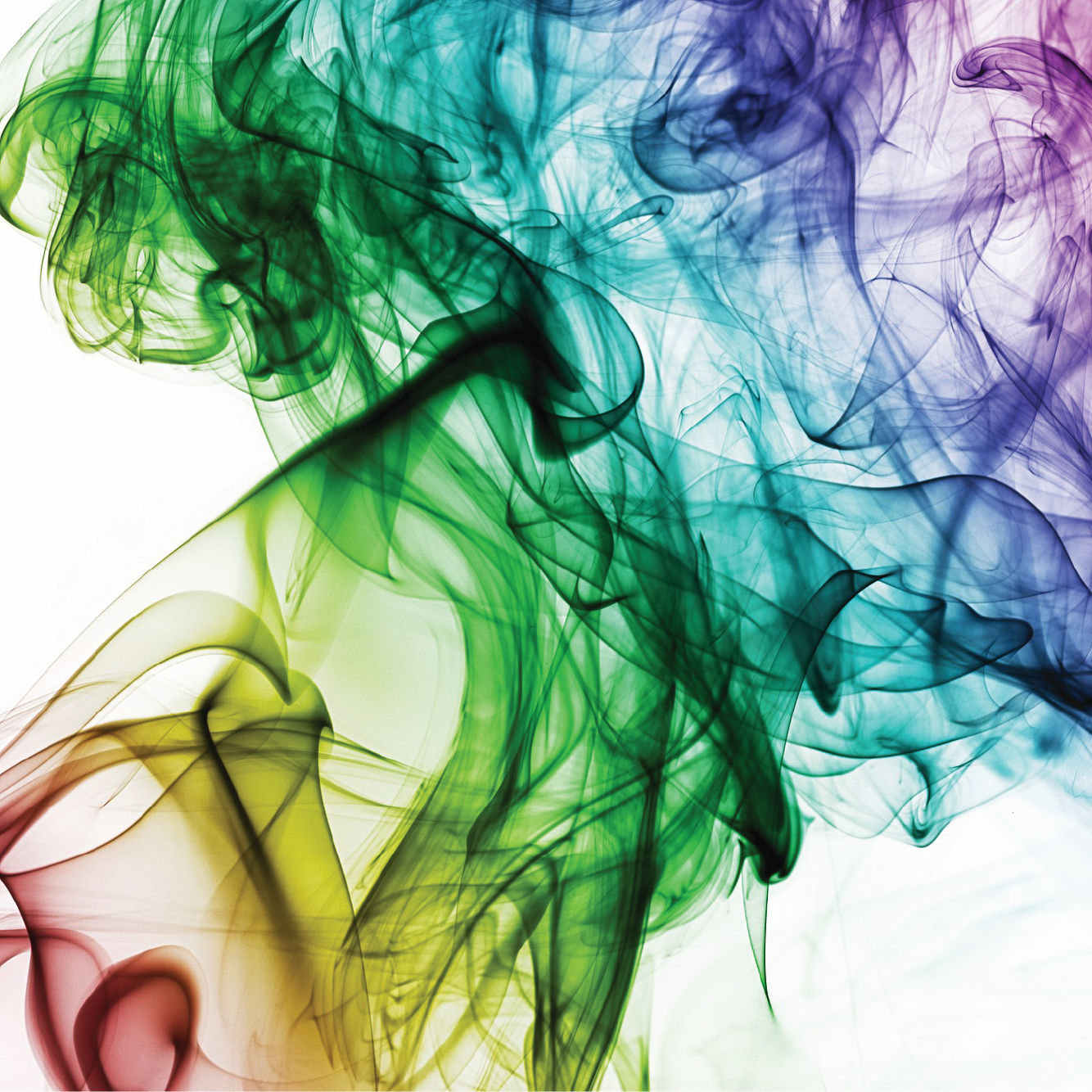 Multicolored ink or smoke swirling against a white background
